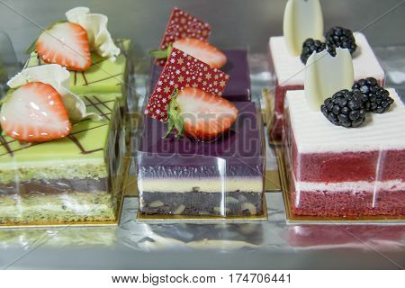 A pistacho layer red and blue cake