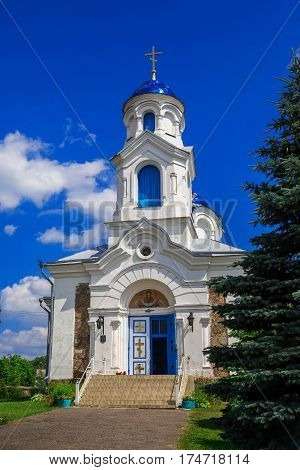 Church St. - Intercession on a background of blue sky old architecture religious places Belarus Village Red Molodechno District