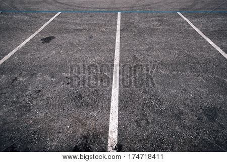 Empty parking lot space for cars vanishing point perspective