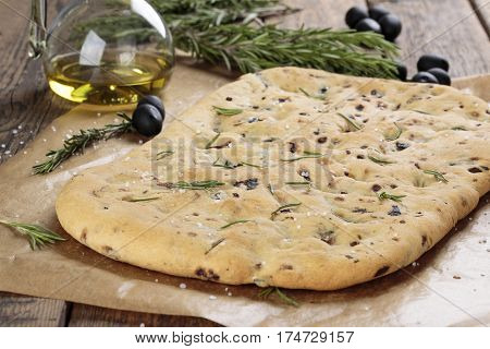 Italian focaccia bread with olives and rosemary.