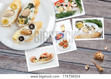 Beautiful snapshots of various italian sandwiches with seafood arranged on rustic wooden background with plates with food and seashells with copy space horizontal top view.