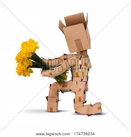Box character on bended knee holding bunch of yellow daffodil flowers Isolated on a white background. Flower delivery or gift concept
