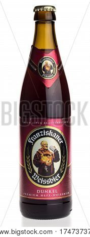GRONINGEN, NETHERLANDS - FEBRUARY 24, 2017: Bottle of German Franziskaner Dunkel wheat beer, isolated on a white background