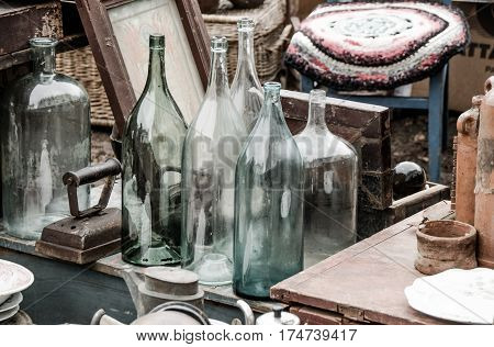 Composition with  vintage bottles and another old things.