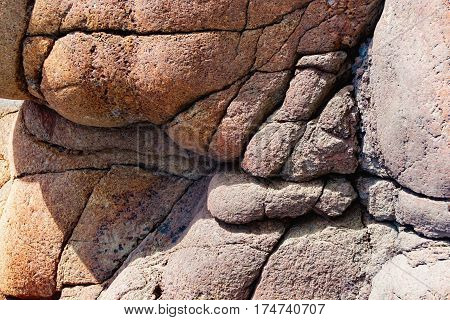 Close up of cracked rock fragment with texture