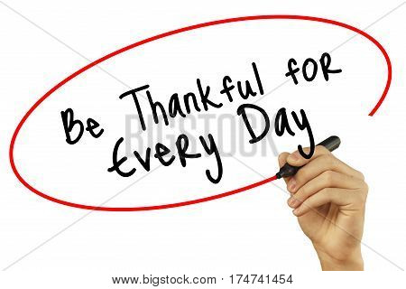 Man Hand Writing Be Thankful For Every Day With Black Marker On Visual Screen. Isolated On White Bac