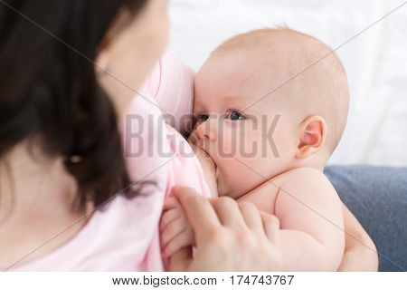 Mother care concept. Breast feeding baby infant.