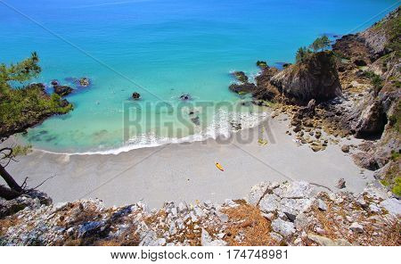 The yelllow canoe on the beach in Crozon Peninsula, Finistere, Brittany, France