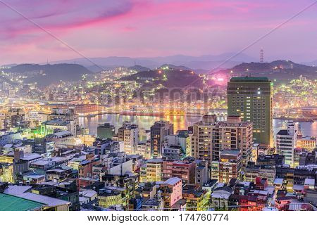 Keelung, Taiwan skyline at twilight towards the port.