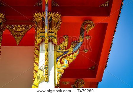 Detail of a traditional buddhist temple roof in thailand