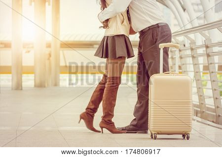 Businessman and businesswoman traveler with luggage at city background Business People Commuter Walking City Life Concept.