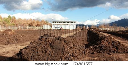 Resen, Macedonia - March 6, 2017: Tractor Mixing Manure,organic Waste And Soil For Producing High Qu