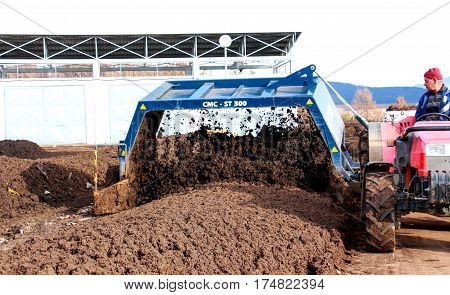 Resen, Macedonia - March 6, 2017: Tractor Mixing Manure,organic Waste And Soil For Producing High Qu