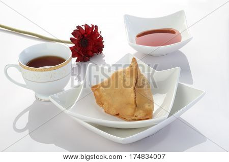 Indian Food Samosa with Tea and Chutney