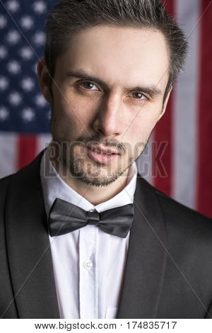 Portrait of a young congressman in the background of the American flag