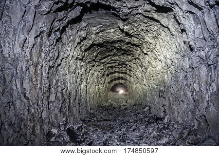 Abandoned chalk mine tunnel with traces of drilling machine, Belgorod, Russia