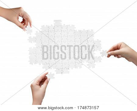 Hand Holding A Piece Of White Uncompleted Puzzle