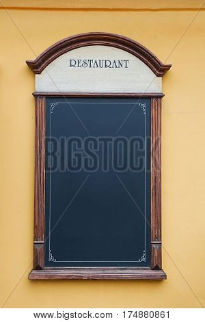 Empty menuboard on a wall