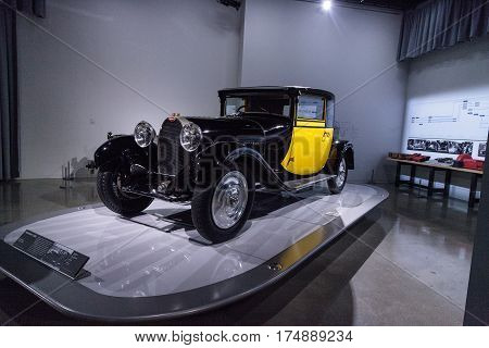 Los Angeles CA USA -- March 4 2017: Yellow and black 1929 Bugatti Type 44 Fiacre at the Petersen Automotive Museum in Los Angeles California United States. Editorial only.