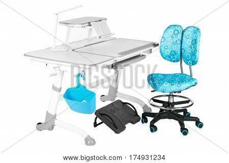Blue chair gray school table blue basket desk lamp and black support under legs on the white isolated background.