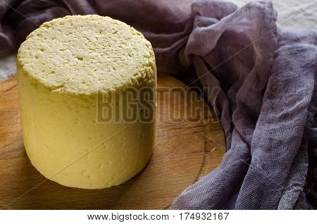 Head Farmhouse Cheese On Wooden Round Board