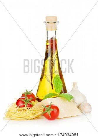 Pasta, tomatoes, basil, olive oil and parmesan cheese. Focus on tomato. Isolated on white background