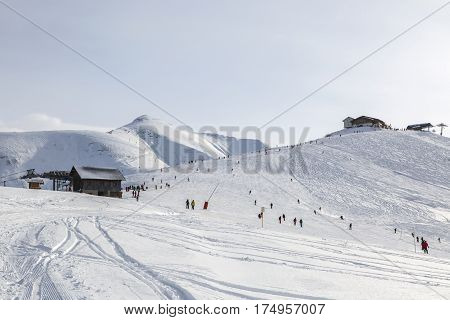 Empty ski domain located at high altitude in Alps in Beaufortain Massif in Haute-Savoie close to Mont Blanc. In the distance can be seen Mont Joly peak at 2525 m .