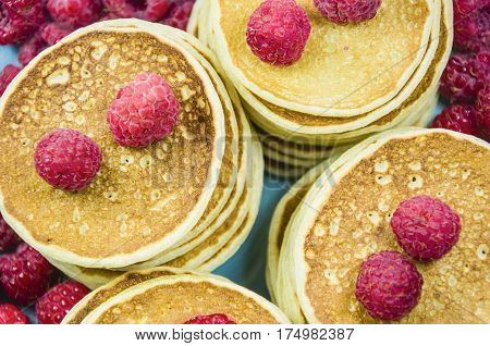 Pancakes with raspberry berries. Maslenitsa. Selective focus