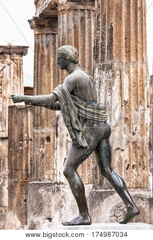 bronze of the god Apollo in the ancient city Pompeii destroyed by the eruption of Vesuvius in the year 79 BC. during the rule of Roman Emperor Vespasian