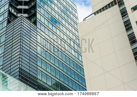 Commercial Tower Building Window With Blue Sky