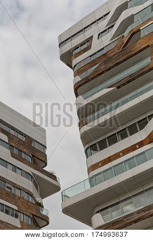 MILAN ITALY-September 2015: Urban Geometry looking towards gap between two residential buildings. New modern residential building houses of City Life business and residential district in Milan. Designed by Zaha Hadid Architects