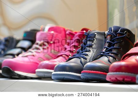 Row of the child shoes in a shop