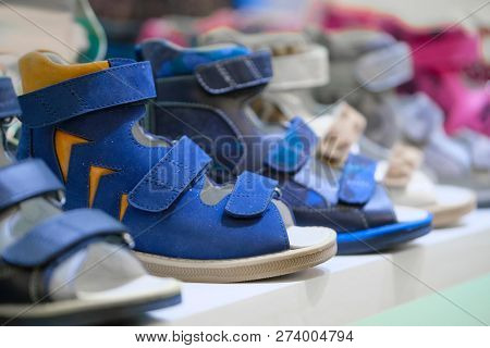 Row of the child shoes in a shop