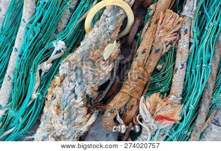 The Background Of Old Colour Ship Tackle, Rusty Chain And Shakle