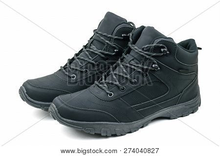 A Pair Of Winter Mens Sneakers Isolated On White Background.