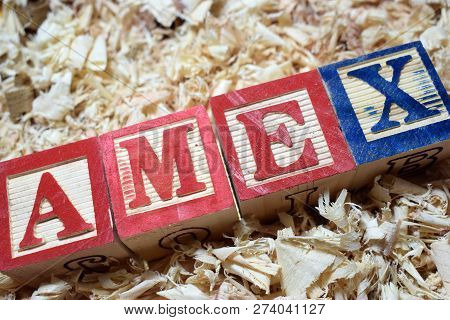 Amex American Express Company On Wooden Block