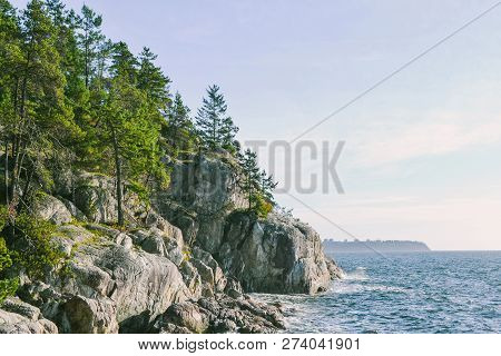View Of Vancouver Over The Burrard Inlet Ocean From Lighthouse Park In West Vancouver On North Shore