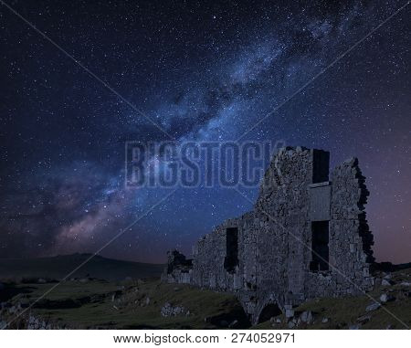 Stunning Vibrant Milky Way Composite Image Over Abandoned Foggintor Quarry In Dartmoor With Raking S