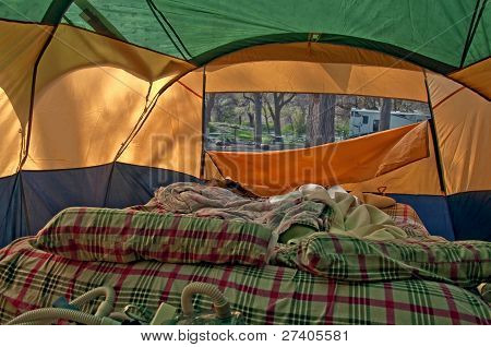 Unmade Airbed Inside Camping Tent