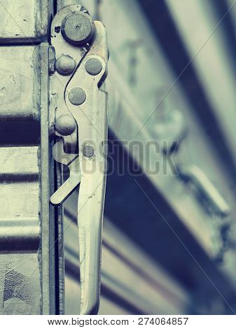 Close Up On Industrial Metal Made Handle Lock For Opening Semi Trailer