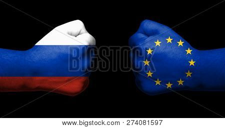 Concept Of Relations/conflict Between Russia And The European Union Symbolised By Two Opossed Clench