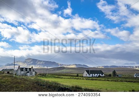 Autumn Countryside Landscape Of The Staffin Area With The Quiraing In Background - Isle Of Skye, Sco
