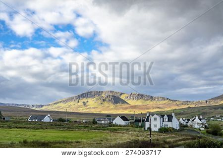 Autumn Countryside Landscape Of The Staffin Area With The Quiraing In Background - Isle Of Skye, Sco