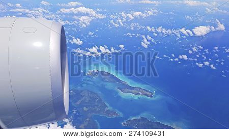 View Of The Islands From The Plane. The View From The Top. The Photo Shows The Engine Of The Aircraf