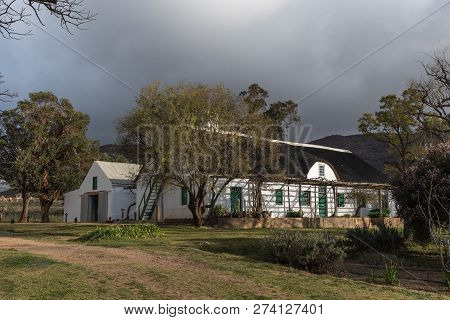 Kromrivier, South Africa, August 25, 2018: An Historic Farm House And Barn At Kromrivier Cederberg P