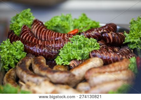 Delicious Grilled Sausages And Vegetable. Delicious Food.