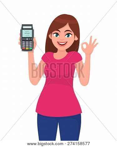 Pretty Happy Young Woman Showing/holding Pos Payment Terminal Or Credit/debit Cards Swiping Machine,