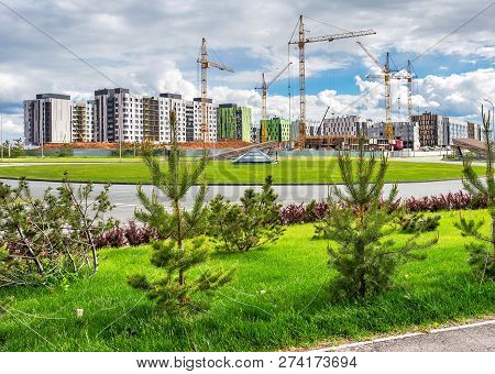Innopolis, Russia - June 11, 2018: New Modern Apartment Buildings Under Construction With Cranes. In