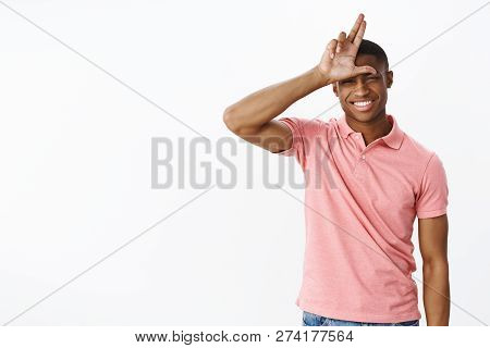 Losers Stay Home. Friendly-looking Joyful And Confident Young African American Male Student In Pink 