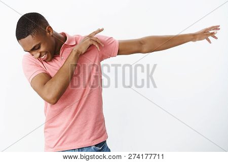 Satisfied Happy And Charismatic Joyful African American Young Guy Making Dab Pulling Hands Right Til